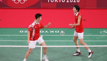 九游体育注册-国羽男双遗憾摘银 李俊慧未能实现奥运“脱衣庆祝”